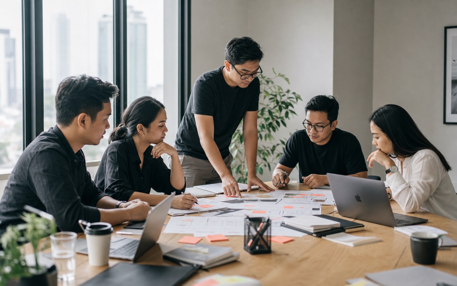 Photograph of an AI studio team planning workforce products